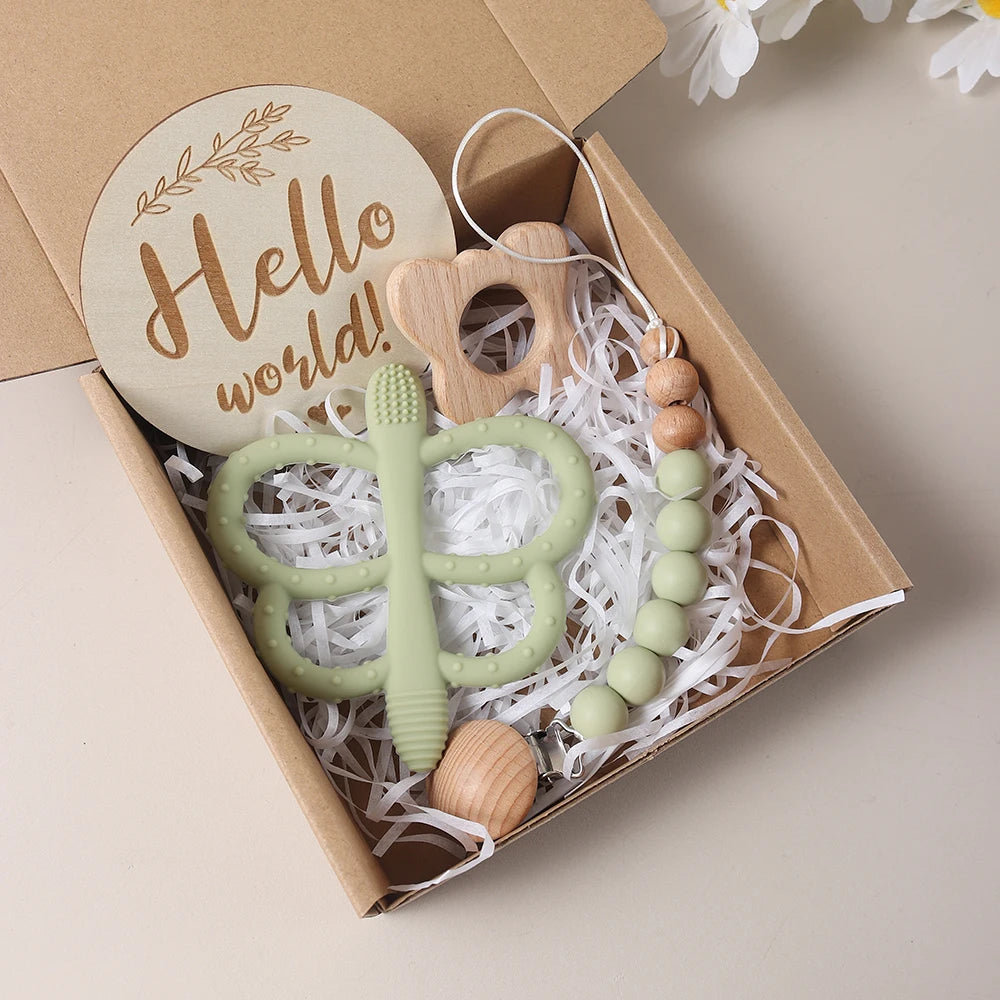 Coffret cadeau naissance bois et silicone vert - Hochet éléphant, attache-tétine et disque Hello World Montessori
