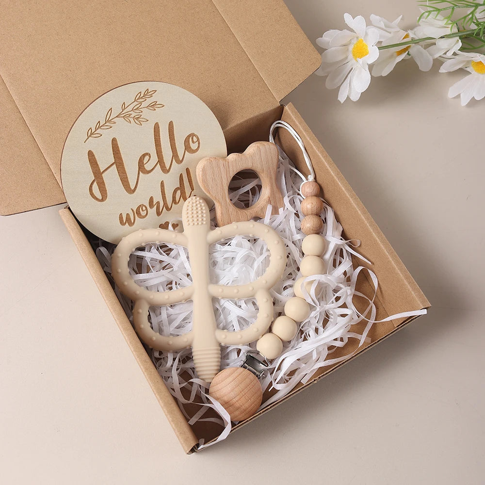 Coffret cadeau naissance bois et silicone beige - Hochet éléphant, attache-tétine et disque Hello World Montessori
