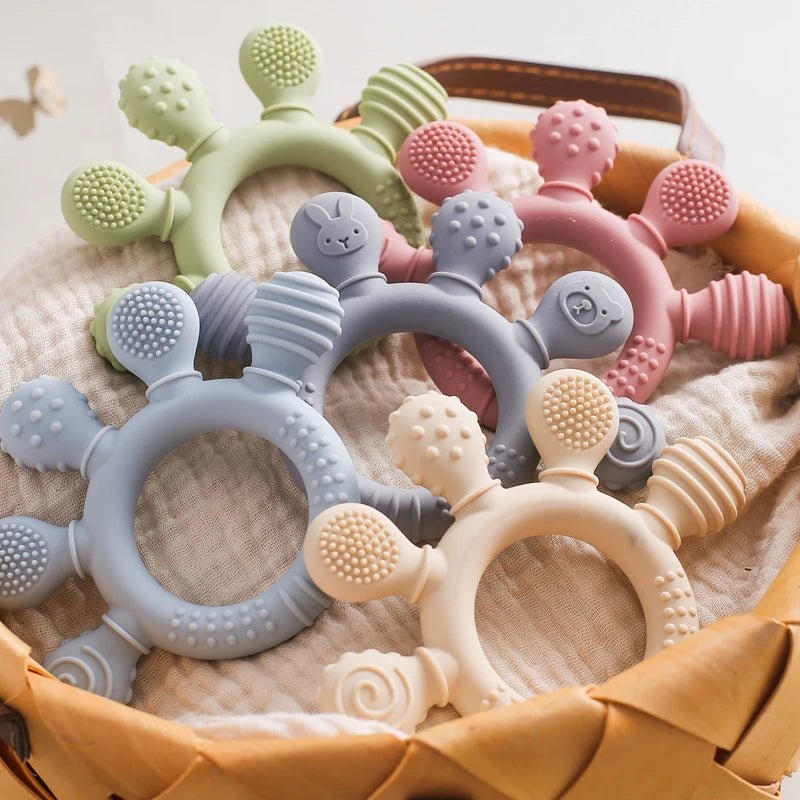 Anneau de dentition bébé en silicone alimentaire – Jouet sensoriel doux, soulage les gencives et favorise l’éveil - Nid’Éveil