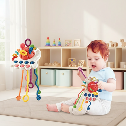 Bébé jouant avec jouet sensoriel pieuvre Montessori - Cordons texturés et boutons pop-it pour éveil tactile
