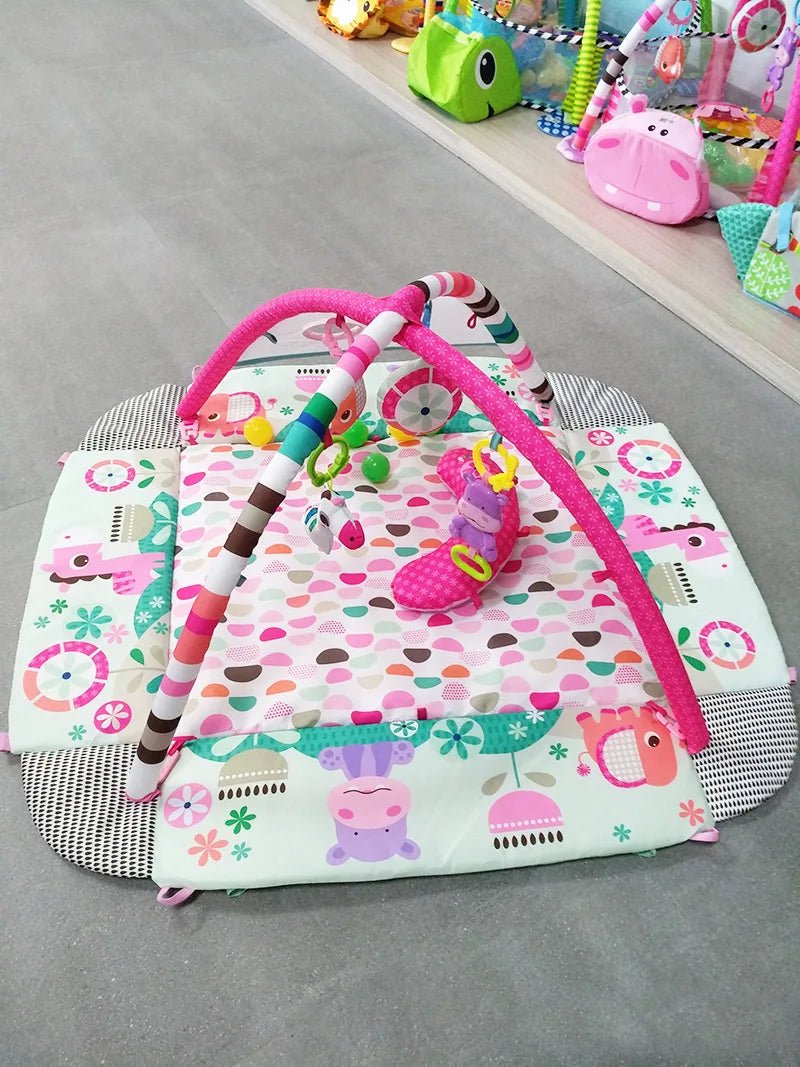 Tapis d’éveil bébé avec arche et jouets suspendus – Aire de jeu sensorielle colorée - Nid’Éveil